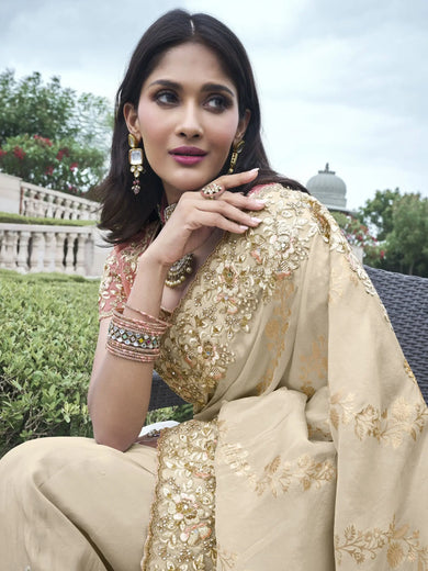 Gorgeous Beige Heavy Border Work Organza Silk Reception Wear Saree